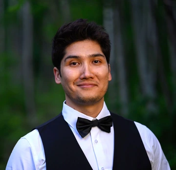Settar Mengli smiling at camera