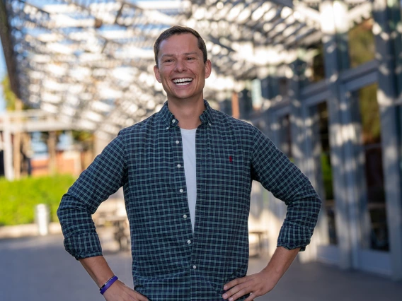 Student smiling at camera